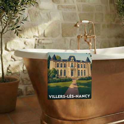 Serviette de bain souvenir de la ville de Villers-lès-Nancy avec une illustration stylisée.