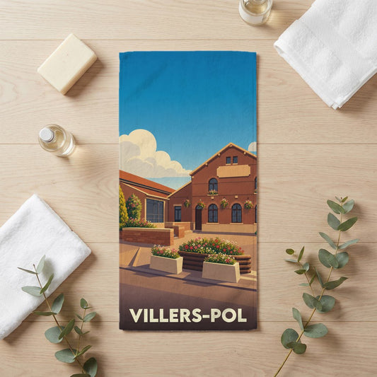 Serviette de bain souvenir de la ville de Villers-Pol avec une illustration stylisée d'un bâtiment traditionnel.