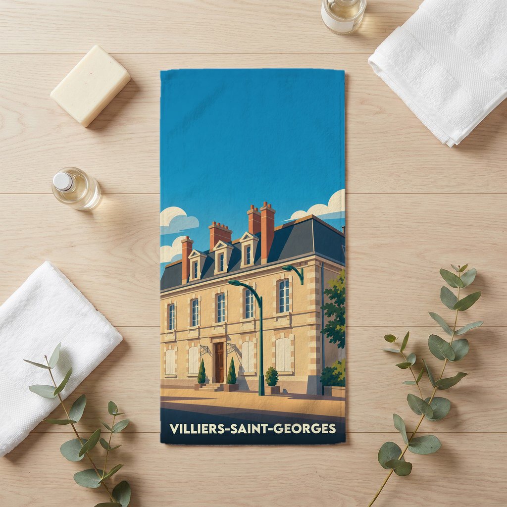 Serviette de bain souvenir de Villiers-Saint-Georges illustrée d'une bâtisse élégante sous un ciel bleu.
