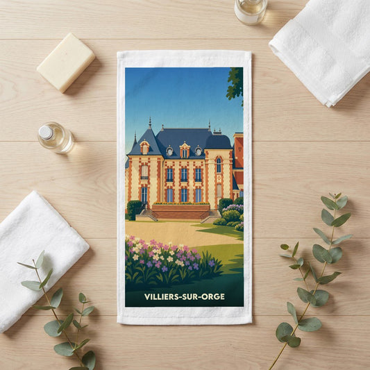 Serviette de bain souvenir de Villiers-sur-Orge illustrant un château de style classique dans un jardin fleuri.