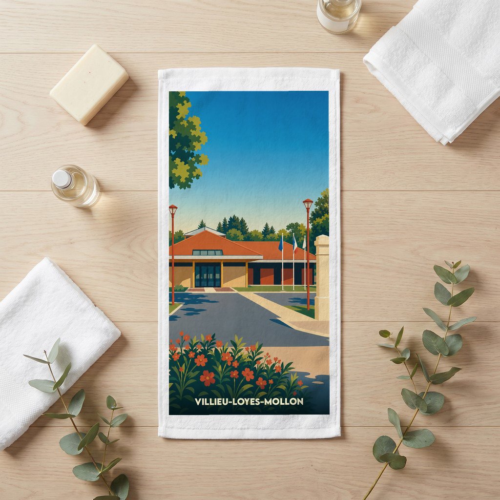 Serviette de bain souvenir de la ville de Villieu-Loyes-Mollon avec une illustration stylisée de sa mairie.