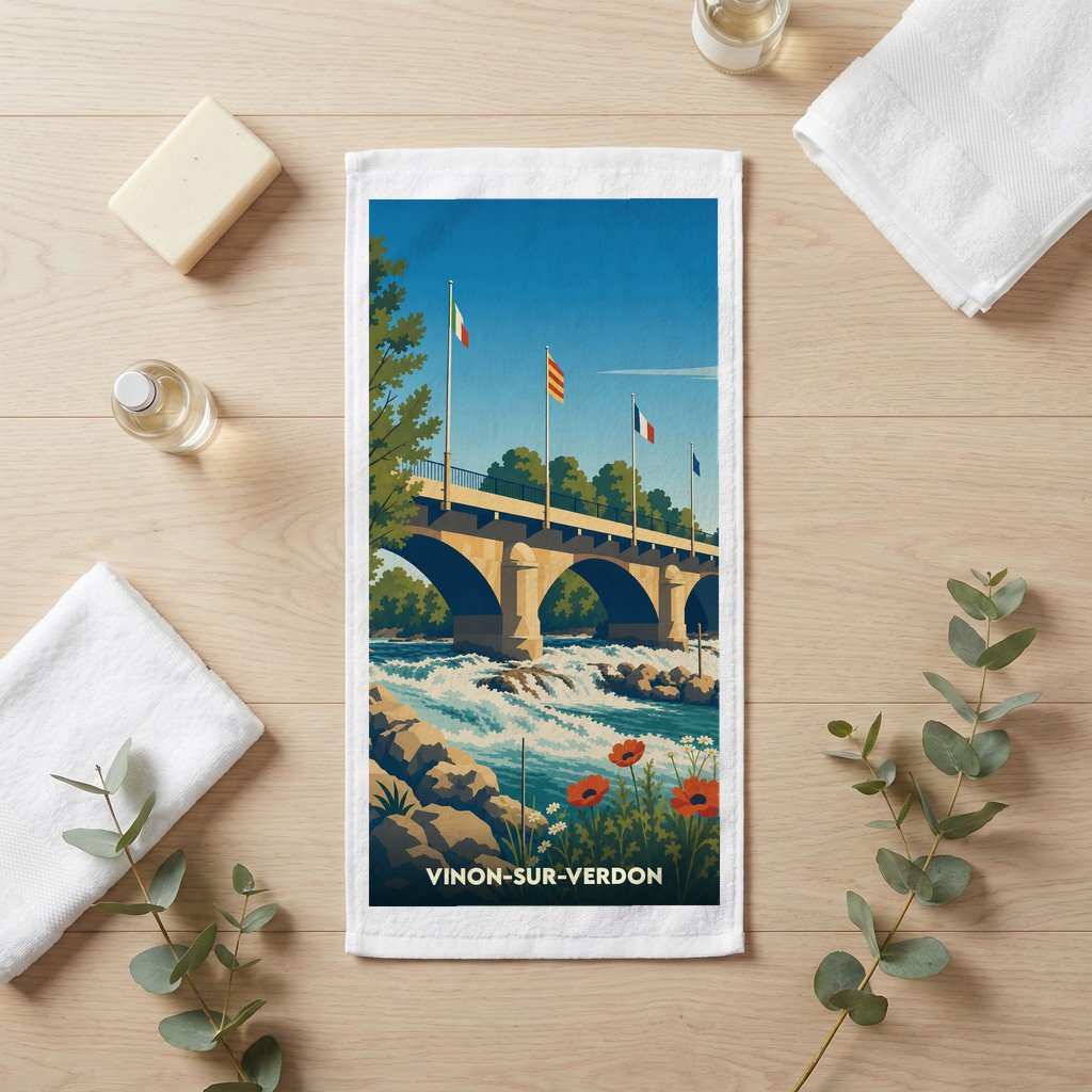 Serviette souvenir de la ville de Vinon-sur-Verdon avec une illustration stylisée d'un pont sur la rivière.