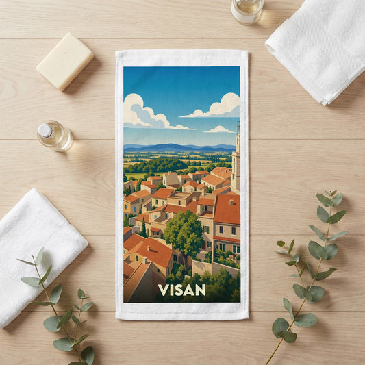 Serviette de bain souvenir de la ville de Visan avec une illustration stylisée de ses toits provençaux.