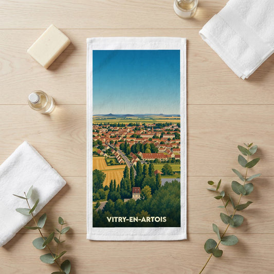 Serviette de bain souvenir de la ville de Vitry-en-Artois avec une illustration panoramique stylisée.