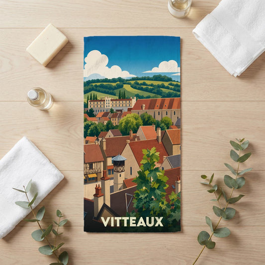 Serviette de bain souvenir de la ville de Vitteaux avec une illustration stylisée de ses toits et collines.