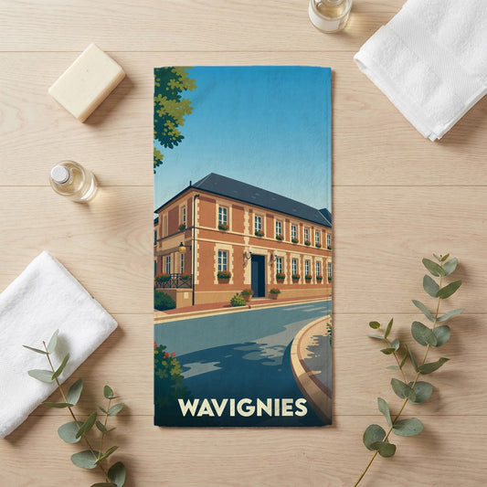 Serviette de bain souvenir de la ville de Wavignies avec une illustration stylisée de son architecture.