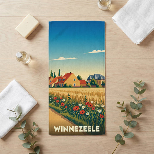 Serviette de bain souvenir de la ville de Winnezeele avec une illustration de paysage champêtre.