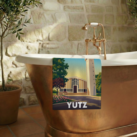 Serviette de bain souvenir de la ville de Yutz avec une illustration stylisée.