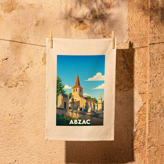 Torchon souvenir de la ville de Abzac avec une illustration stylisée d'une église et de son cimetière.