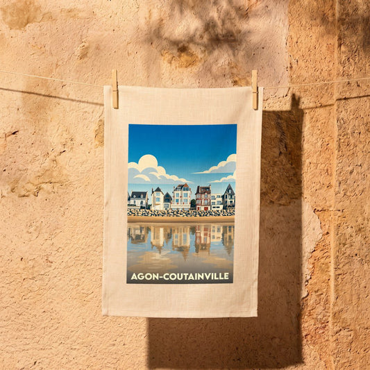 Torchon souvenir de la ville d'Agon-Coutainville avec une illustration stylisée de son front de mer.