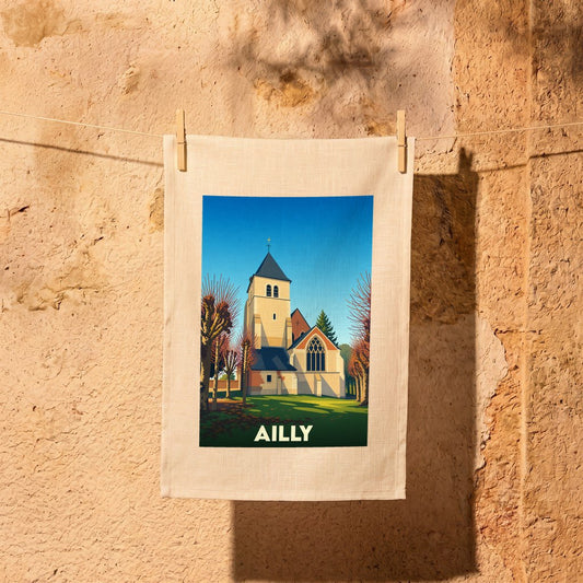 Torchon souvenir de la ville d'Ailly avec une illustration stylisée d'une église.