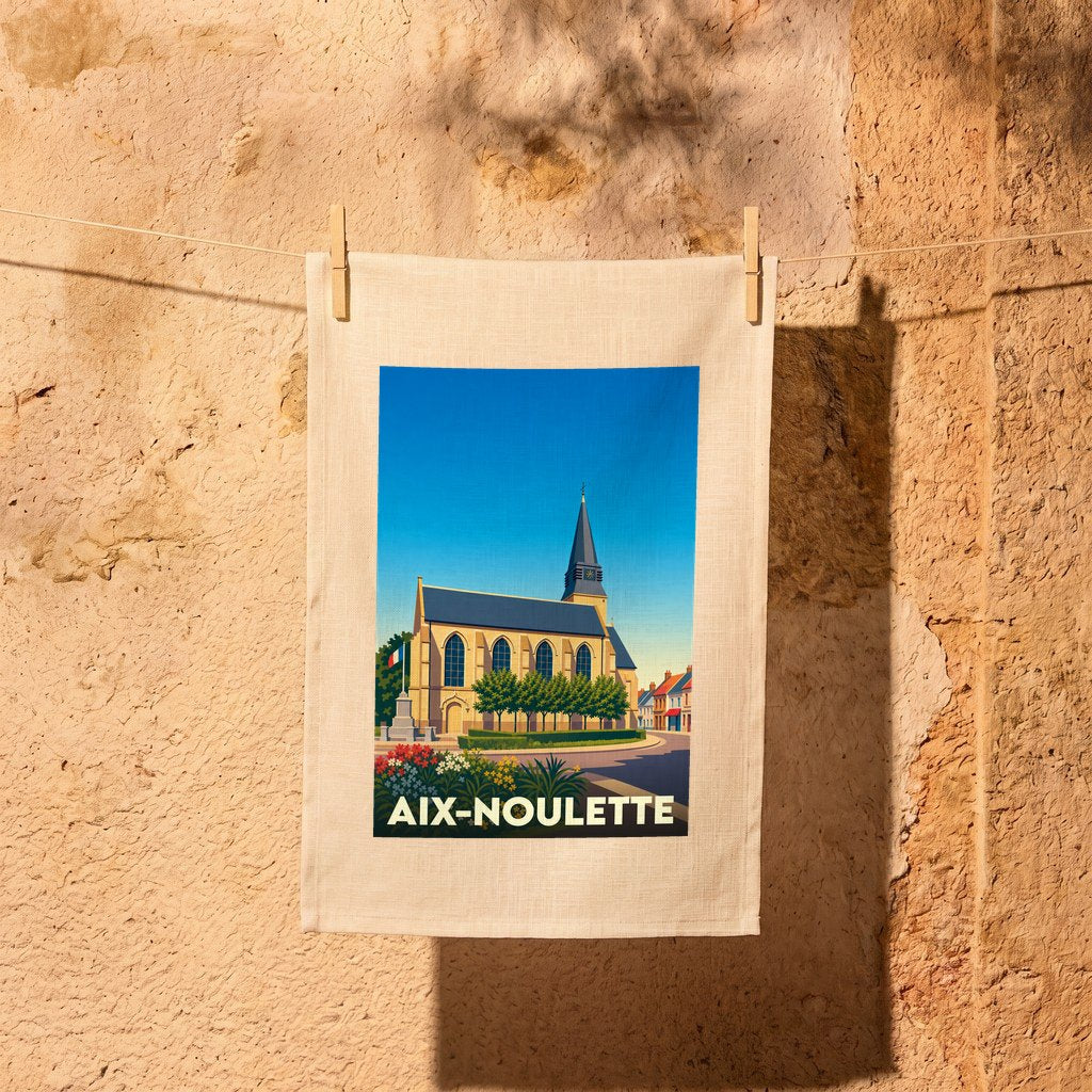 Torchon souvenir de la ville de Aix-Noulette avec une illustration stylisée d'une église sous un ciel bleu.