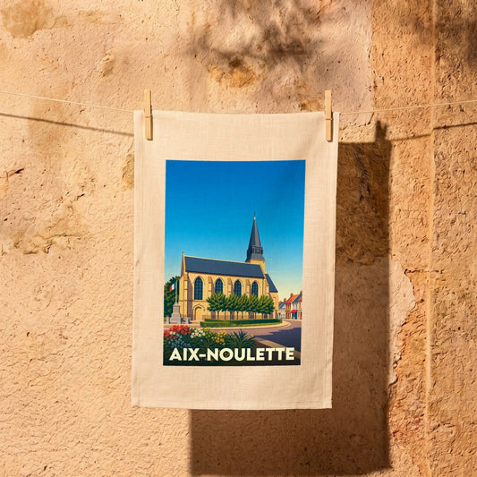Torchon souvenir de la ville de Aix-Noulette avec une illustration stylisée d'une église sous un ciel bleu.