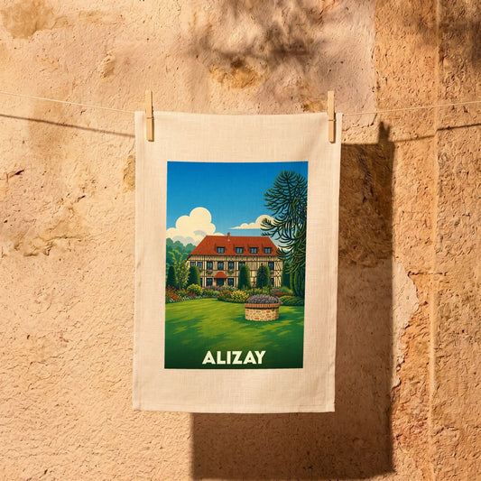 Torchon souvenir de la ville d'Alizay avec une illustration colorée représentant une maison traditionnelle et son jardin.
