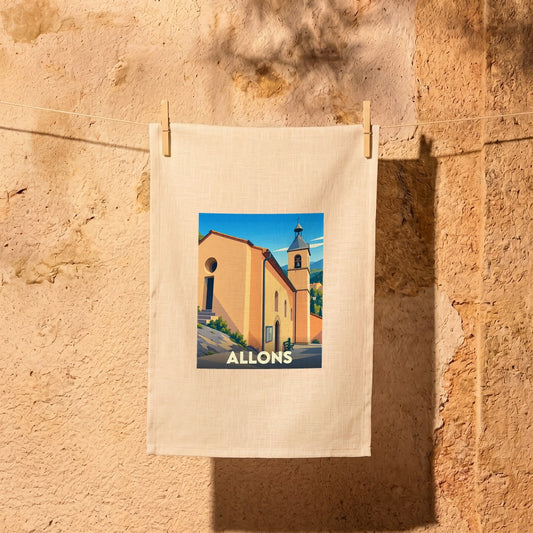 Torchon souvenir de la ville d'Allons avec une illustration stylisée d'une église provençale.