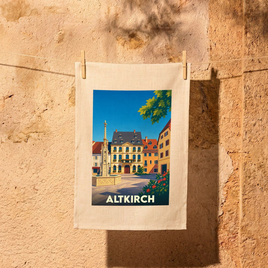 Torchon de cuisine souvenir de la ville d'Altkirch orné d'une illustration colorée de sa place historique.