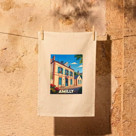 Torchon souvenir de la ville d'Amilly avec une illustration stylisée d'un bâtiment typique.