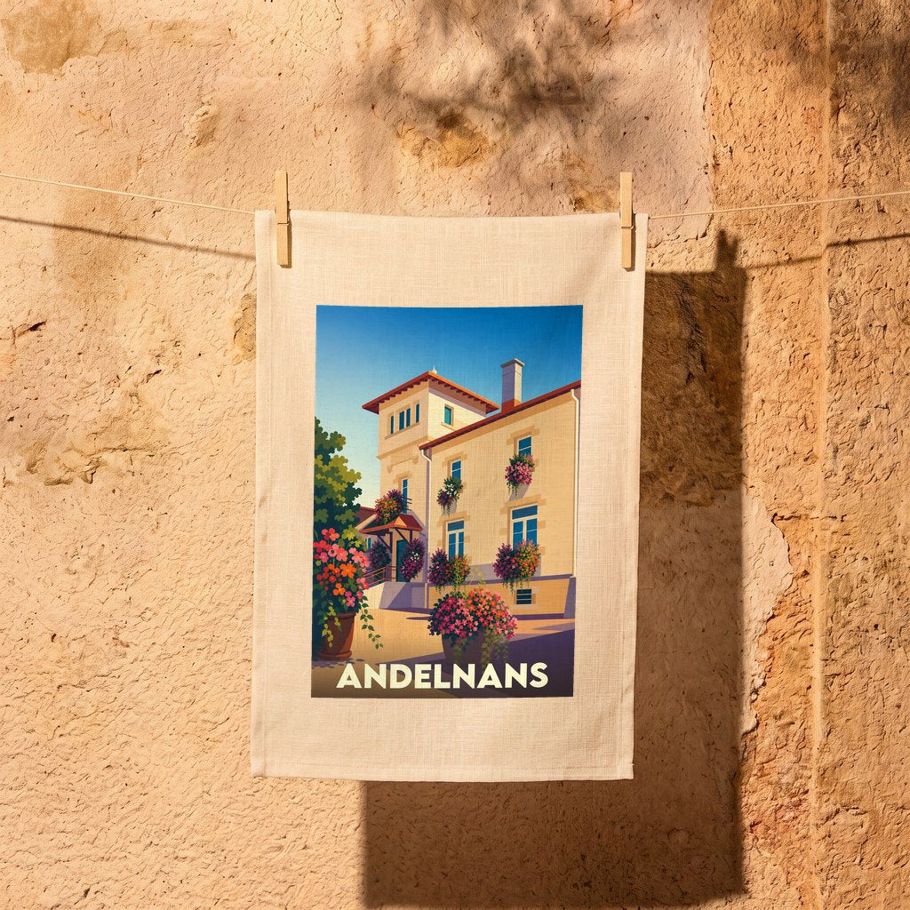 Torchon souvenir de la ville d'Andelnans orné d'une illustration stylisée d'une bâtisse fleurie.