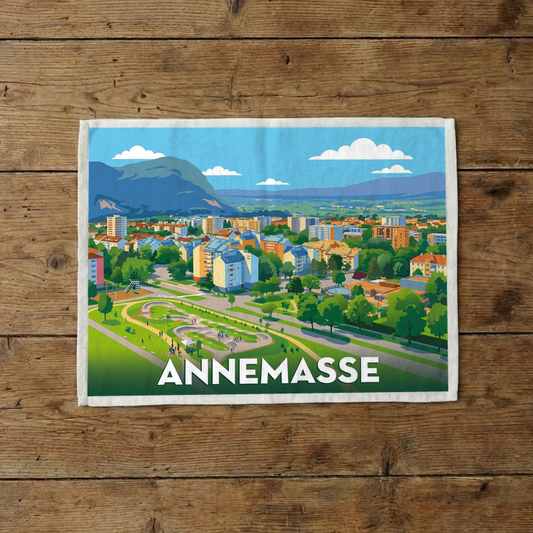 Torchon souvenir de la ville d'Annemasse avec une illustration colorée et stylisée.