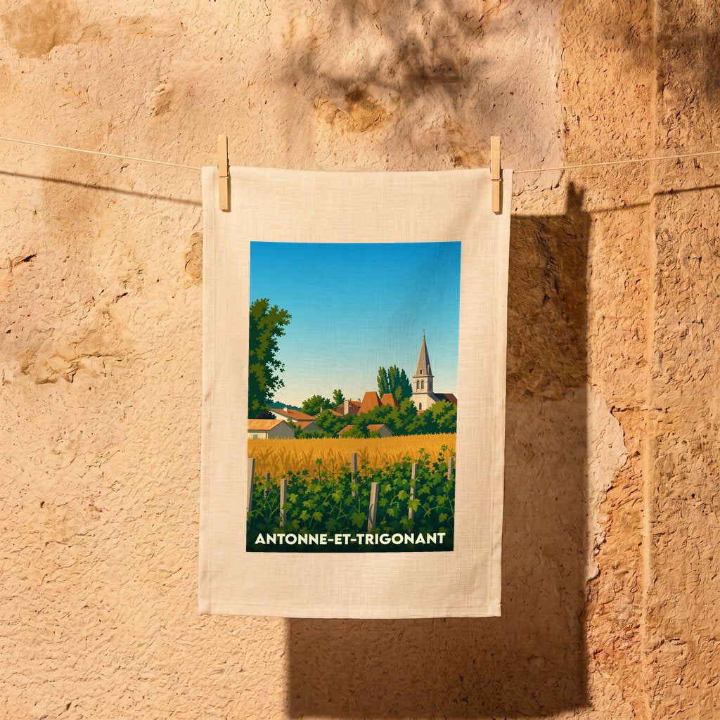 Torchon souvenir de la ville de Antonne-et-Trigonant avec une illustration stylisée de paysages ruraux.