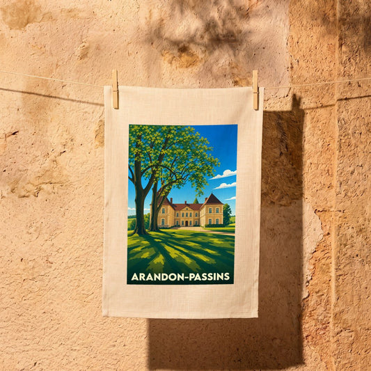 Torchon souvenir de la ville de Arandon-Passins avec une illustration stylisée d'un château.