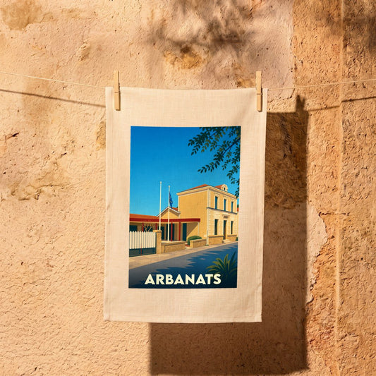 Torchon souvenir de la ville d'Arbanats avec une illustration stylisée d'un bâtiment sous un ciel bleu.