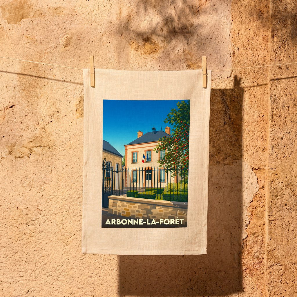 Torchon souvenir de la ville d'Arbonne-la-Forêt avec une illustration stylisée d'un bâtiment municipal.