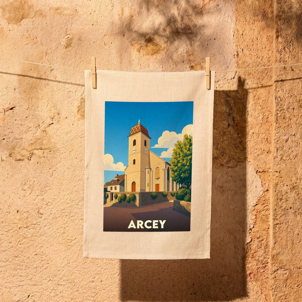 Torchon souvenir de la ville d'Arcey avec une illustration stylisée de son église.
