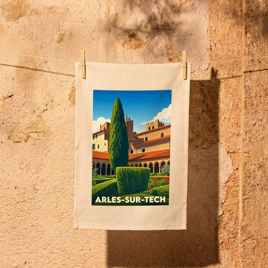 Torchon souvenir de la ville d'Arles-sur-Tech avec une illustration stylisée de son abbaye et de ses jardins.