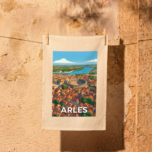 Torchon souvenir de la ville d'Arles avec une illustration stylisée de ses arènes et du Rhône.