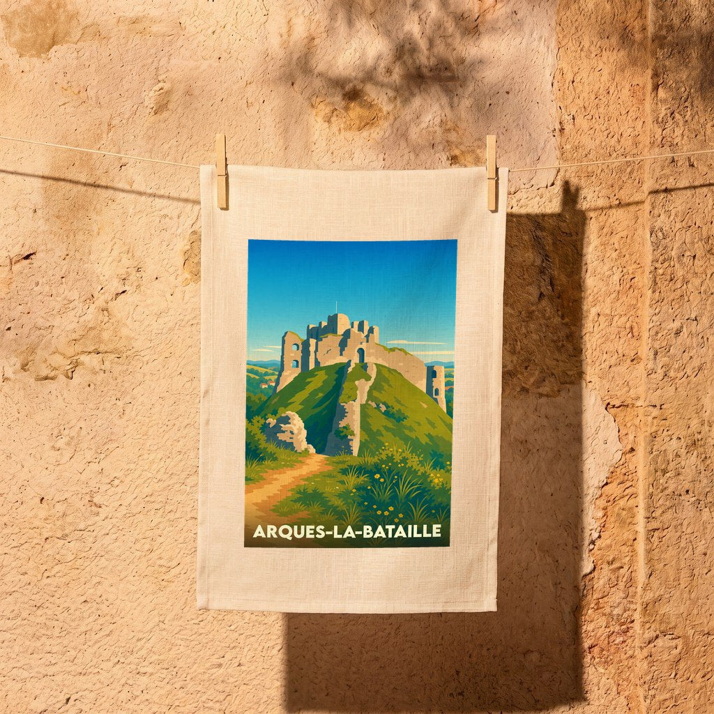 Torchon souvenir de la ville d'Arques-la-Bataille avec une illustration stylisée de son château médiéval.