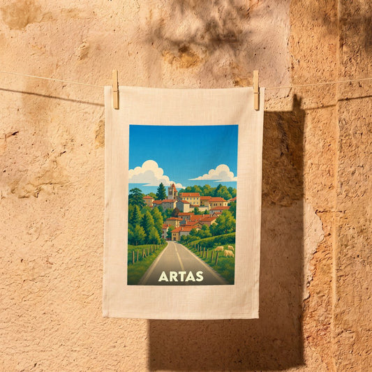 Torchon souvenir de la ville d'Artas orné d'une illustration stylisée de son paysage vallonné.