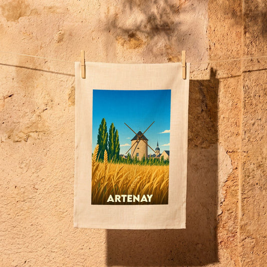 Torchon souvenir de la ville d'Artenay orné d'une illustration stylisée représentant un moulin et des champs de blé.