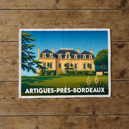 Torchon souvenir de la ville d'Artigues-près-Bordeaux avec une illustration stylisée d'un château.