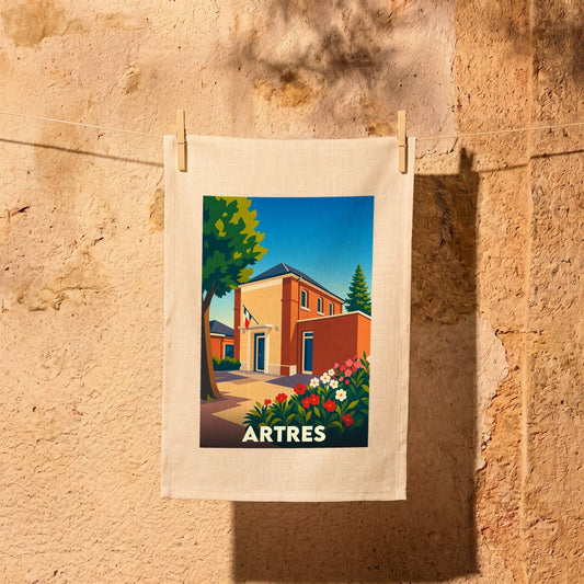 Torchon souvenir de la ville de Artres avec une illustration stylisée.