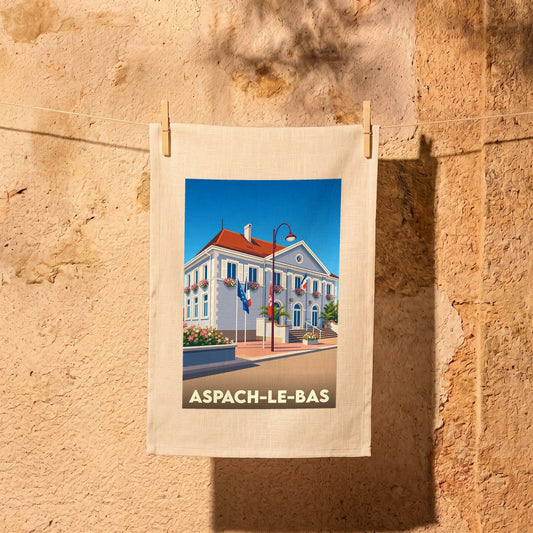Torchon souvenir de la ville d'Aspach-le-Bas avec une illustration stylisée de sa mairie.