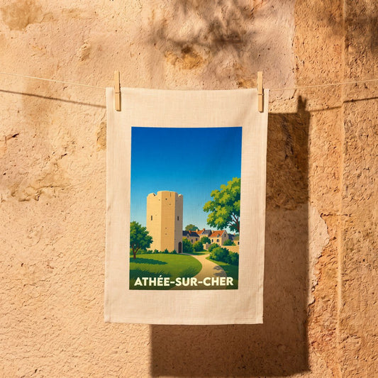 Torchon souvenir de la ville d'Athée-sur-Cher avec une illustration stylisée d'une tour médiévale.