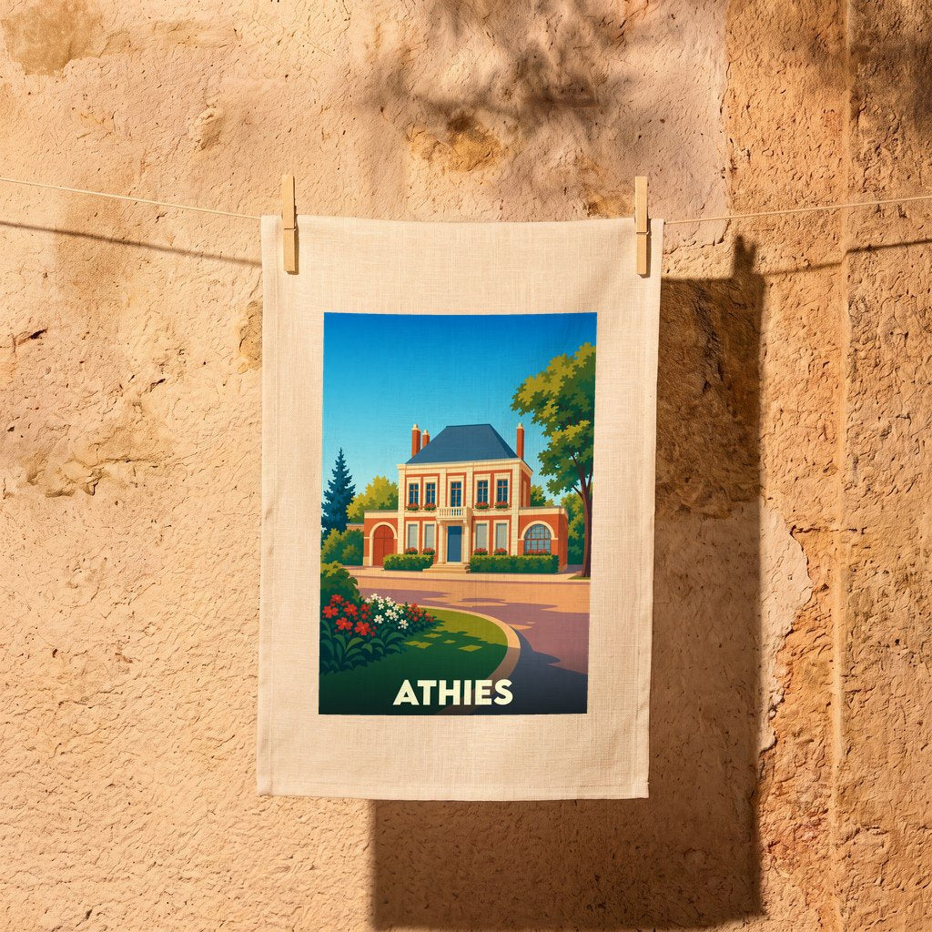 Torchon souvenir de la ville d'Athies orné d'une illustration stylisée d'une demeure traditionnelle.