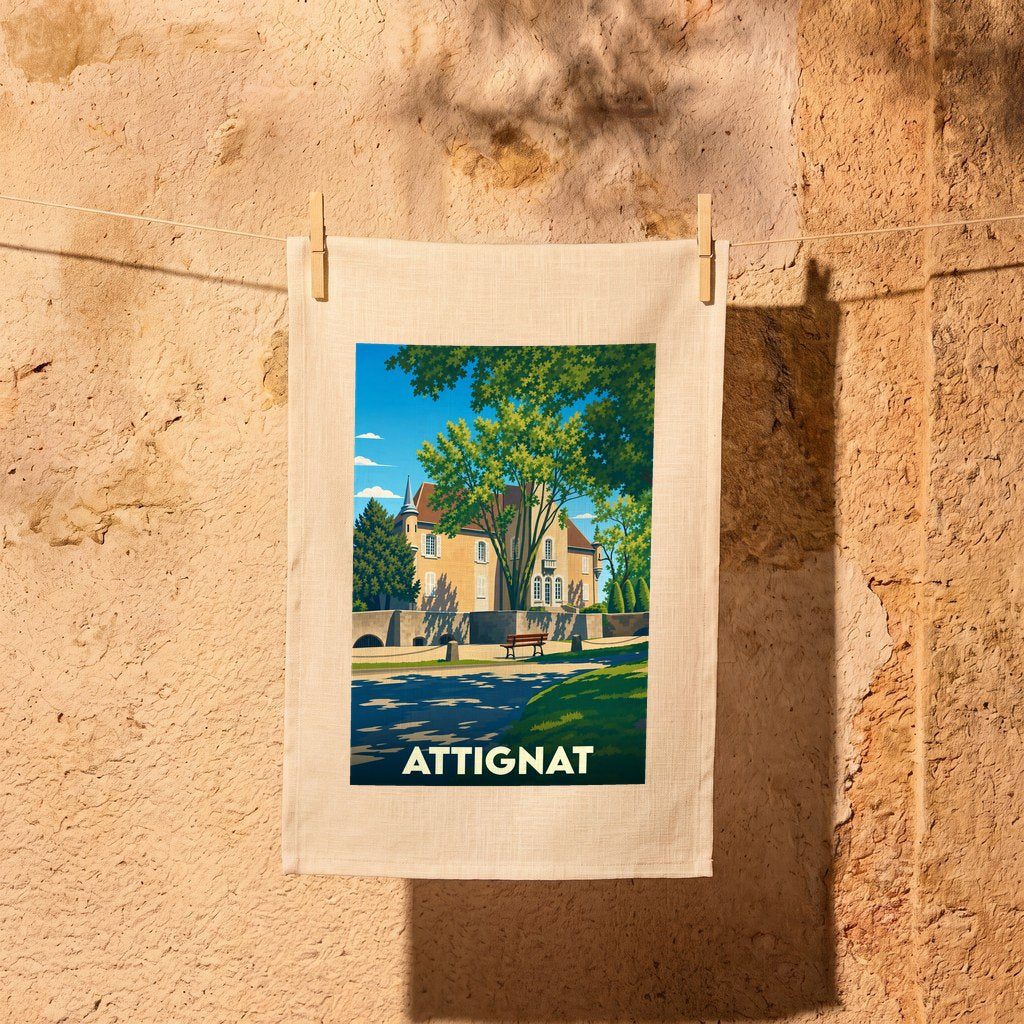 Torchon souvenir de la ville d'Attignat orné d'une illustration stylisée de son patrimoine architectural.