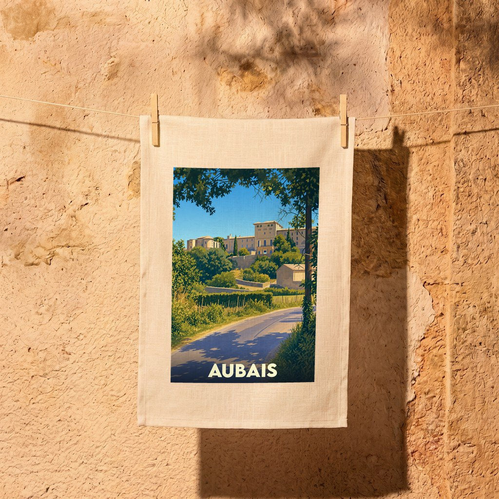 Torchon souvenir de la ville d'Aubais arborant une illustration stylisée du village et de son château.