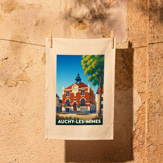 Torchon souvenir de la ville de Auchy-les-Mines avec une illustration stylisée de l'hôtel de ville.