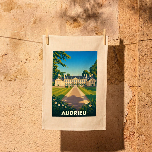 Torchon souvenir de la ville d'Audrieu orné d'une illustration stylisée de son château.