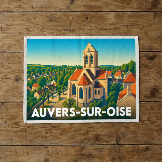 Torchon souvenir de la ville de Auvers-sur-Oise illustrant son église emblématique dans un style graphique coloré.