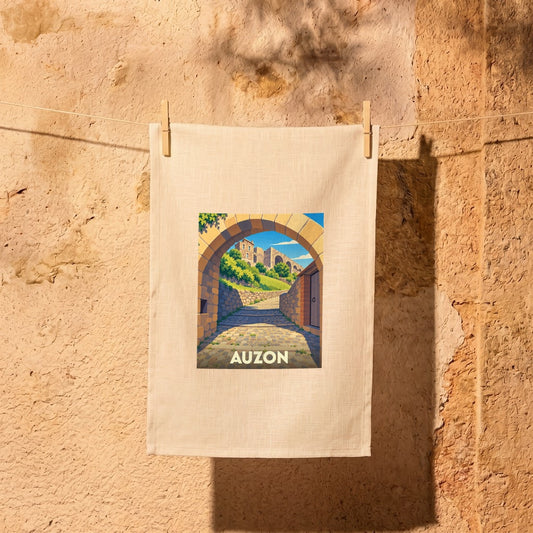Torchon souvenir de la ville d'Auzon avec une illustration stylisée d'une arche en pierre.