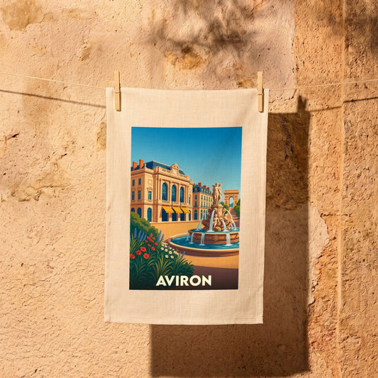 Torchon souvenir de la ville d'Aviron avec une illustration stylisée d'une place ensoleillée.