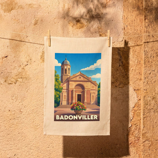 Torchon souvenir de la ville de Badonviller illustré par une vue stylisée de son église.