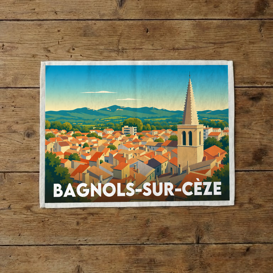 Torchon souvenir de la ville de Bagnols-sur-Cèze avec une illustration stylisée.