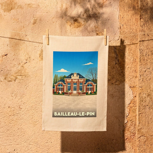 Torchon souvenir de la ville de Bailleau-le-Pin avec une illustration stylisée de sa mairie.