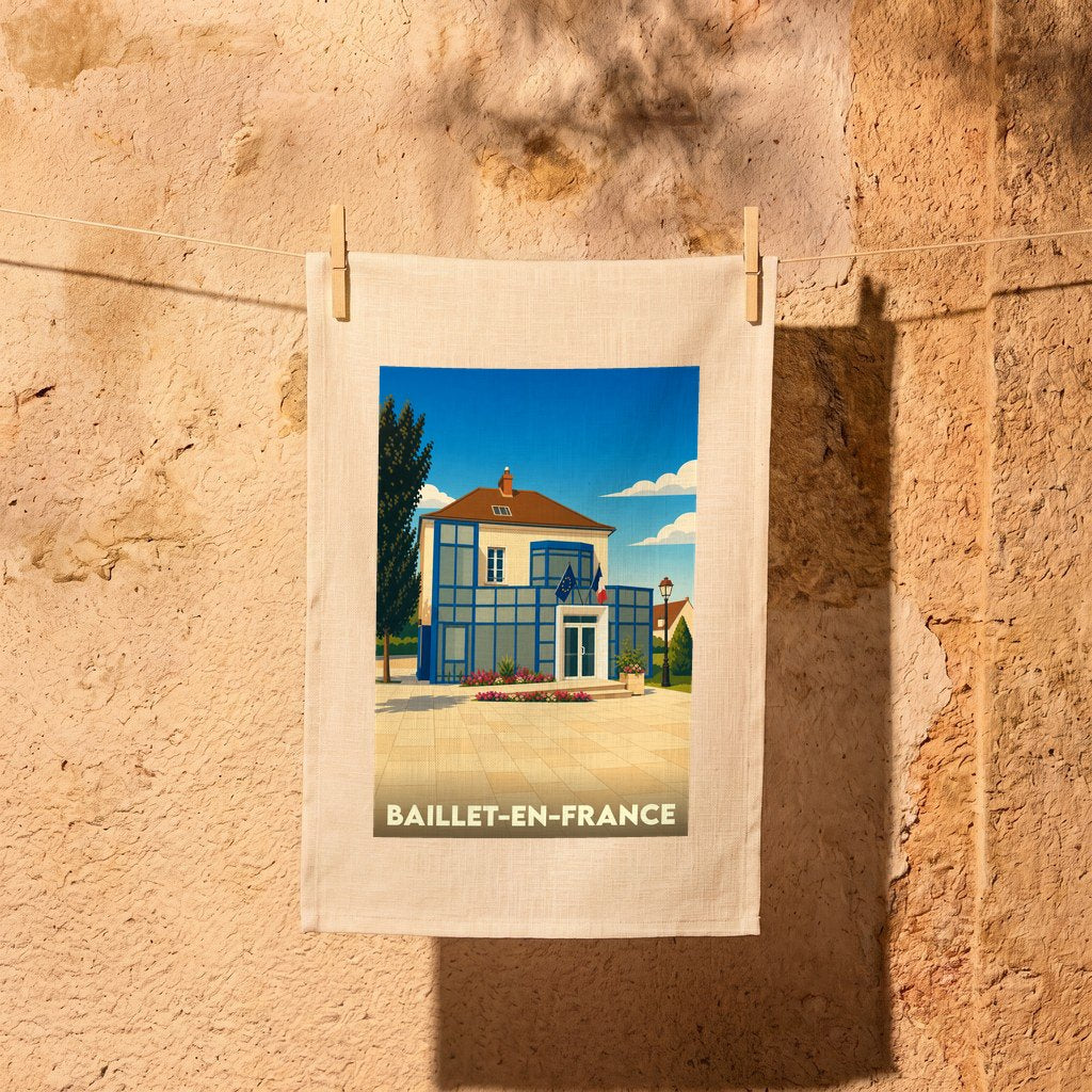 Torchon souvenir de la ville de Baillet-en-France avec une illustration stylisée de sa mairie.