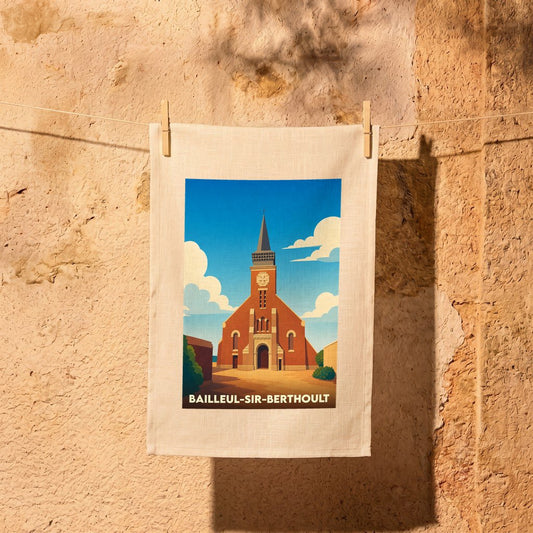 Torchon souvenir de la ville de Bailleul-Sir-Berthoult avec une illustration stylisée de son église.